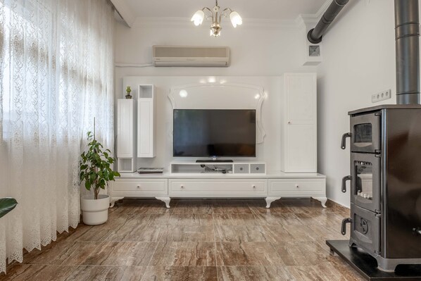 Villa | Living area | Fireplace