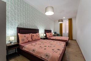 Comfort Quadruple Room | Select Comfort beds, desk, laptop workspace, soundproofing - Hostel Antique (Pula)