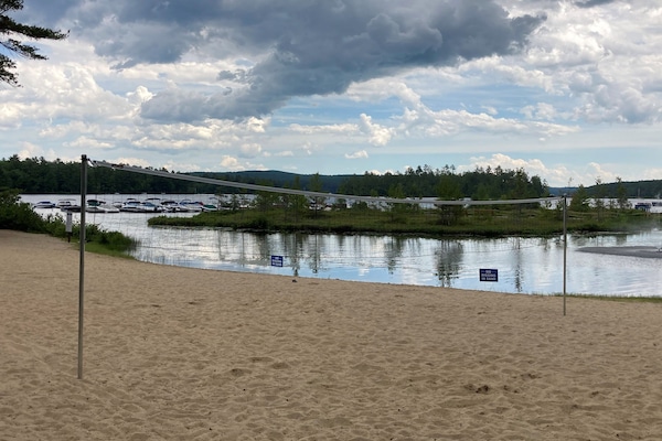 association beach, swim area, fishing and kayak storage area.