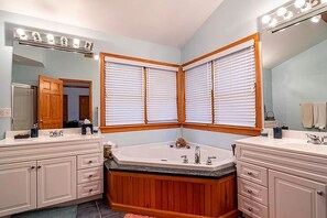 Bathtub, hair dryer, towels, soap