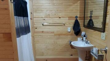 Shower, towels, soap, toilet paper
