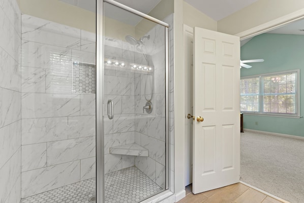 Combined shower/tub, hair dryer, towels, toilet paper