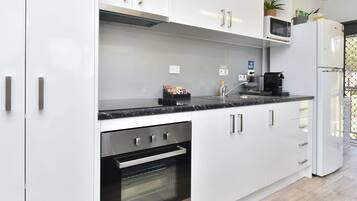 Fridge, microwave, coffee/tea maker, toaster