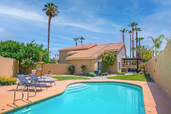 Sparkling swimming pool, perfect for a relaxing dip.