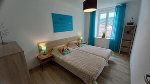 3 bedrooms, desk, iron/ironing board, travel cot
