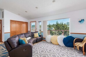 Smart TV, fireplace, table football, books