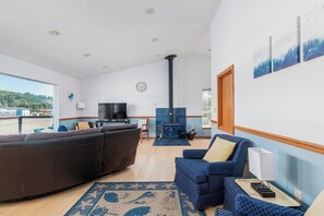 Smart TV, fireplace, table football, books