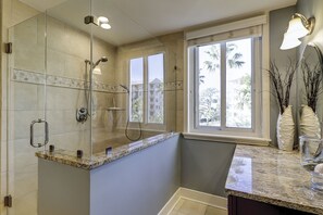 Bathtub, hair dryer, towels