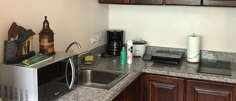 Microwave, coffee/tea maker, cookware/dishes/utensils