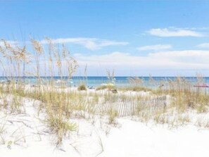 On the beach, sun-loungers