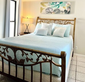 1 bedroom, desk, iron/ironing board, travel crib