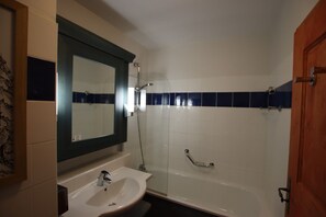 Combined shower/tub, hair dryer, bathrobes, slippers