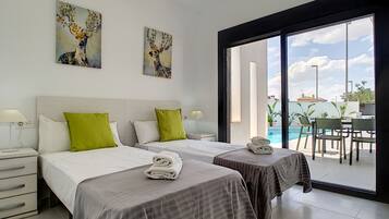 3 dormitorios, tabla de planchar con plancha, wifi gratis y ropa de cama