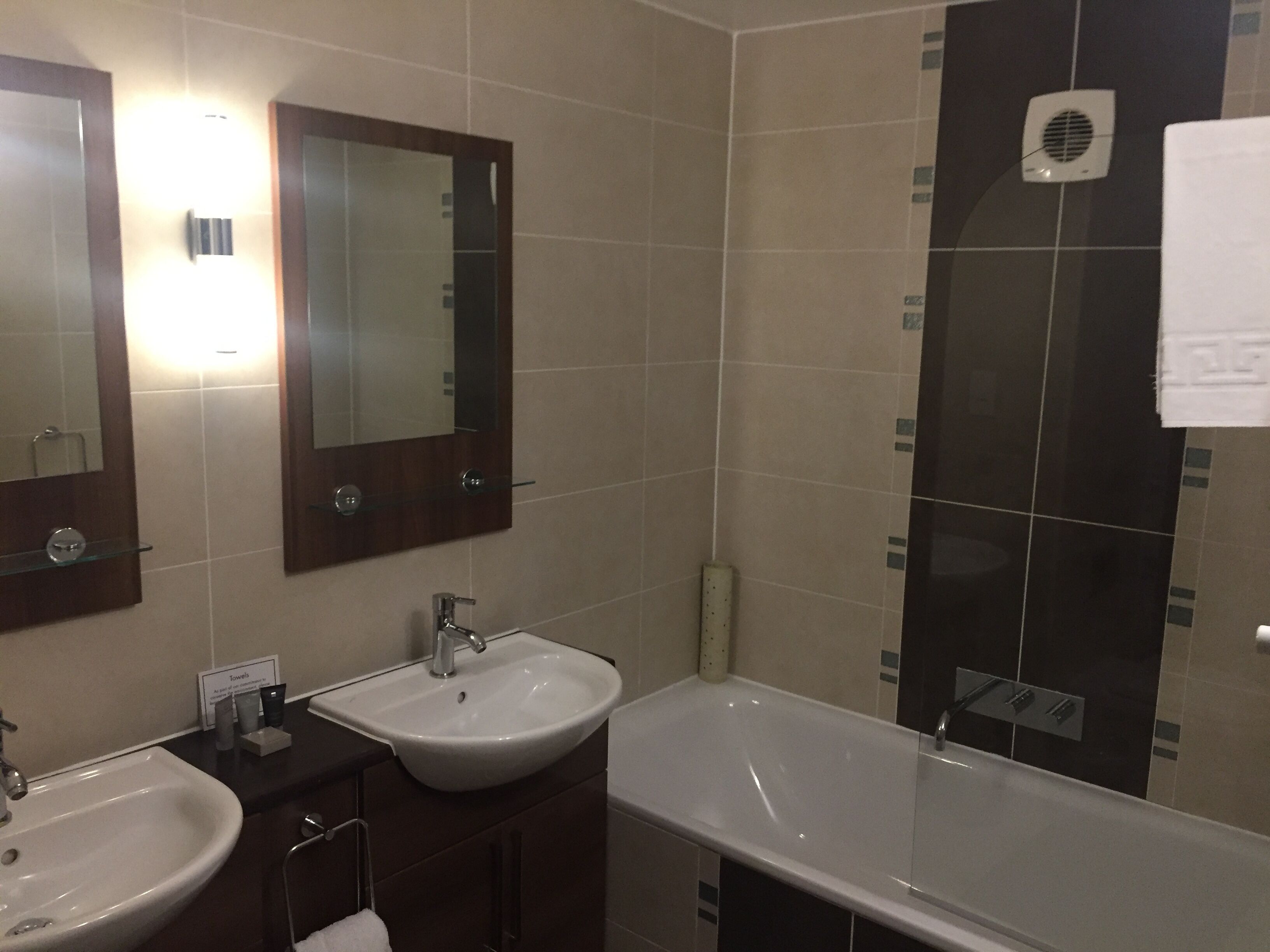 Combined shower/tub, hair dryer, towels, soap