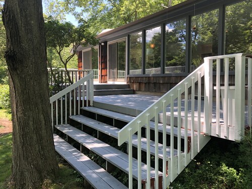 Riverfront retreat in the woods of scenic Weston, Connecticut. 