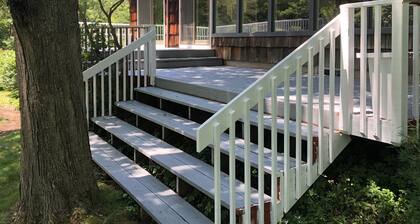 Riverfront retreat in the woods of scenic Weston, Connecticut.