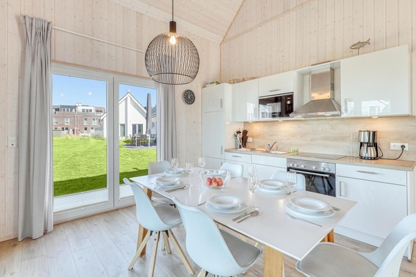 Een koelkast, een kookplaat, een vaatwasser