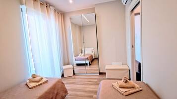 2 dormitorios, tabla de planchar con plancha, wifi gratis y ropa de cama