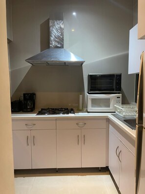 Fridge, microwave, oven, stovetop