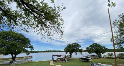 Lake front guest cabin with a boat ramp and dock. Bring your boat