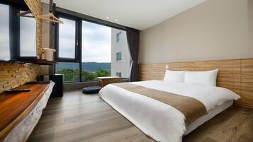 Habitación Elite doble | Mobiliario individual, cortinas opacas, wifi gratis y ropa de cama