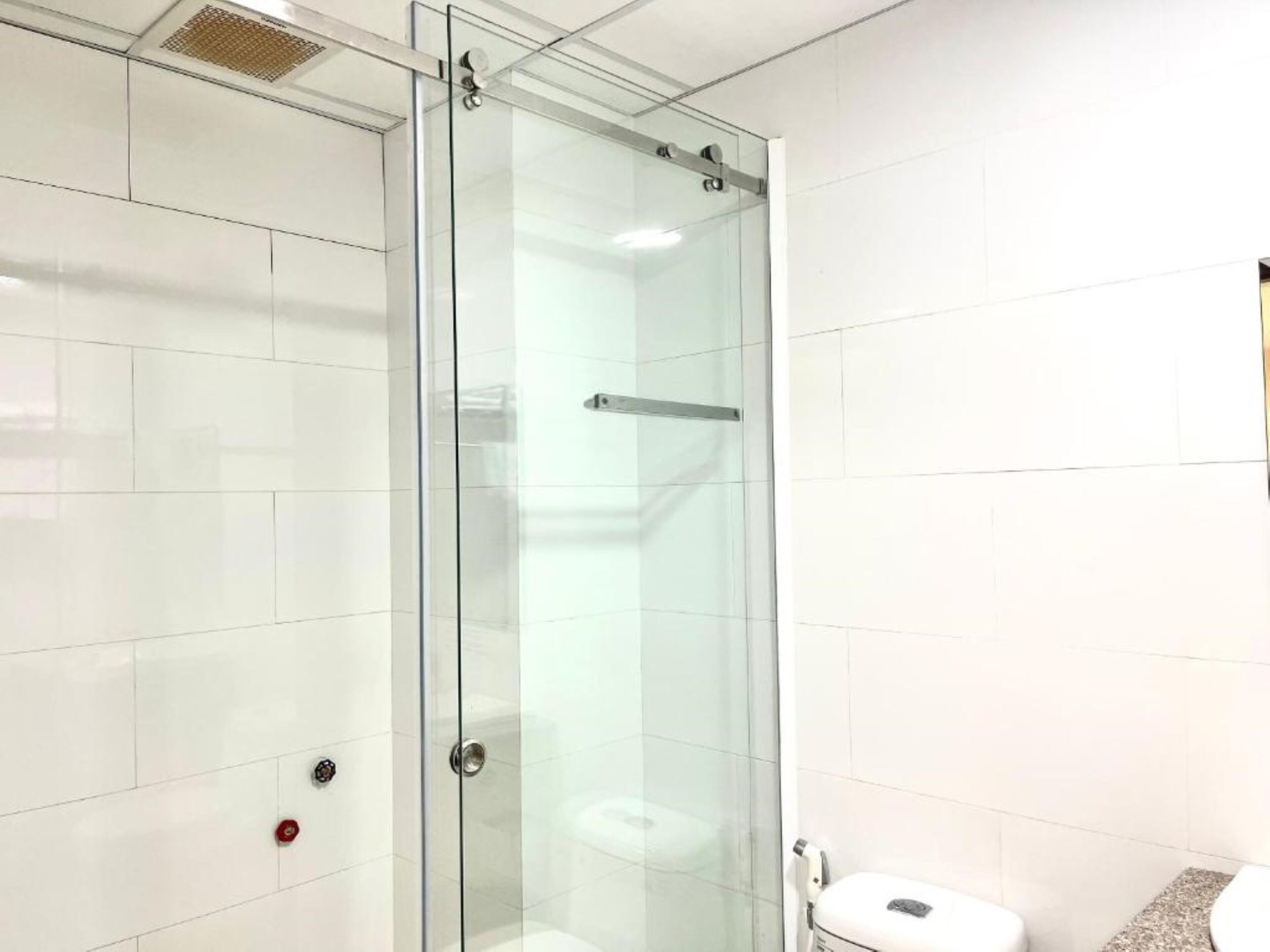 shower, free toiletries, slippers