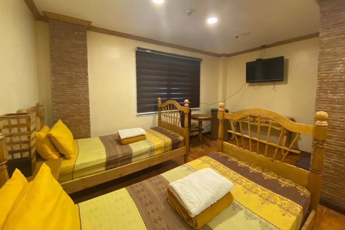Habitación estándar con 2 camas individuales | Ropa de cama