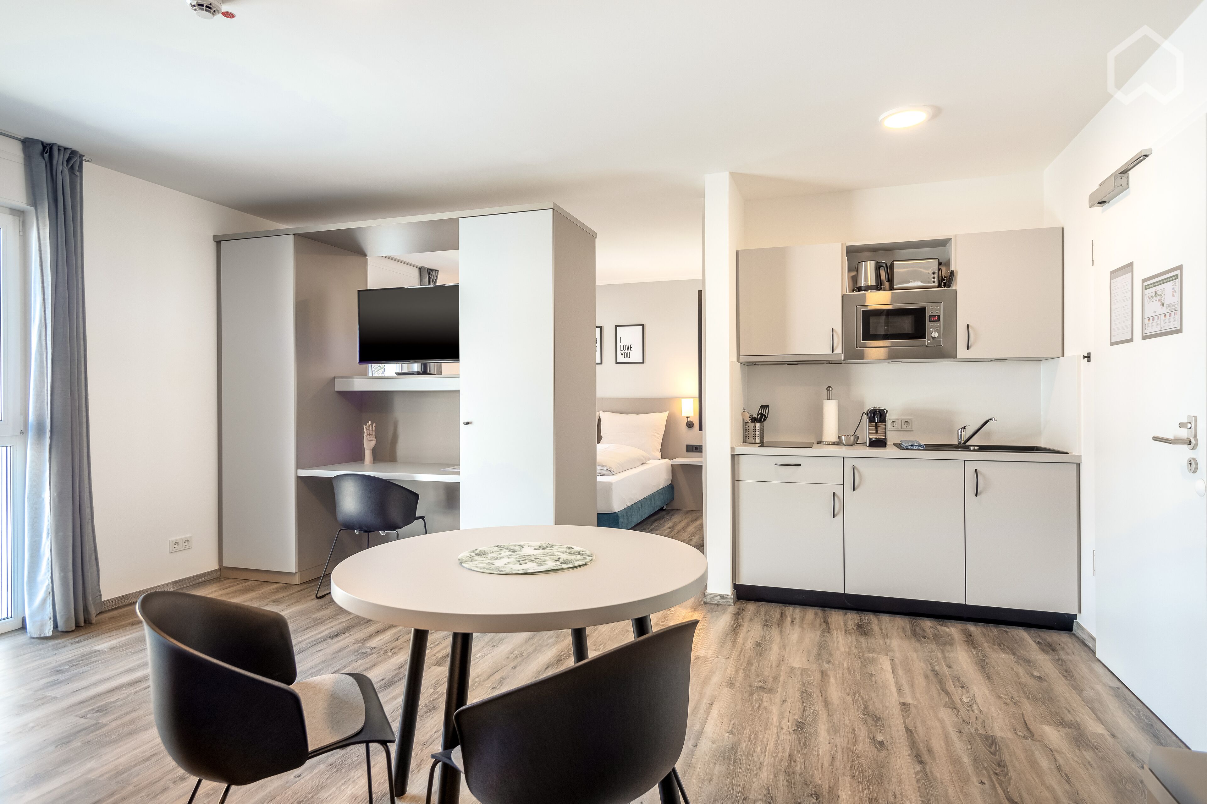 Standard Apartment | Living area | Smart TV, heated floors