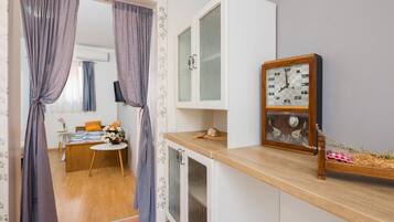 Apartment, 1 Queen Bed with Sofa bed | 1 bedroom, iron/ironing board, free WiFi, bed sheets