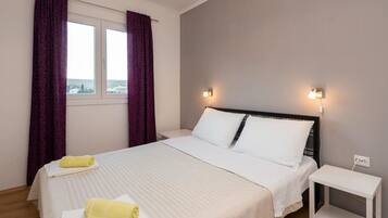 Apartment, Multiple Beds | 2 bedrooms, iron/ironing board, free WiFi, bed sheets