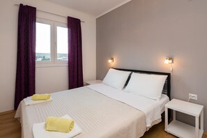 Apartment, Multiple Beds | 2 bedrooms, iron/ironing board, free WiFi, bed sheets - 3 - Modern Apartment With Garden, 80m From Beach (Marina)