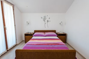 Appartement, Plusieurs lits | 2 chambres, accès au Wi-Fi (inclus), literie fournie