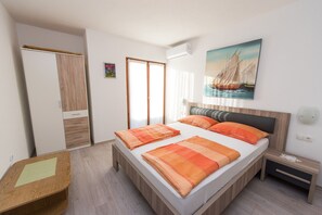 Apartment, 2 Queen-Betten | 2 Schlafzimmer, kostenloses WLAN, Bettwäsche