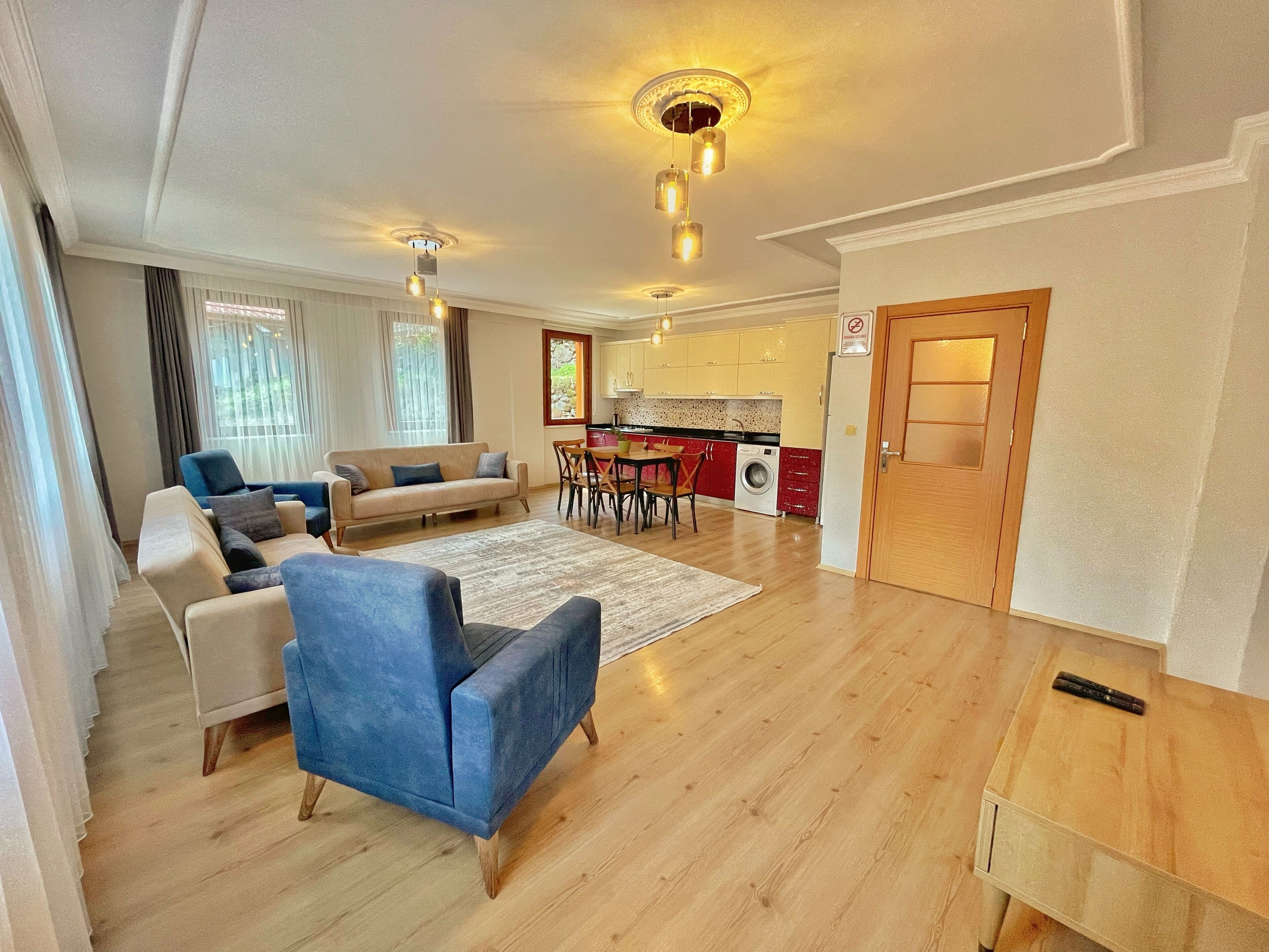 Lake View King Suite | Living area | 82-cm LCD TV with satellite channels, TV, heated floors