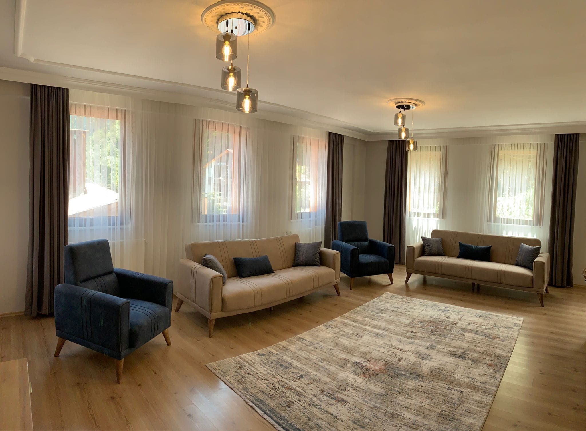 Lake View King Suite | Living area | 82-cm LCD TV with satellite channels, TV, heated floors