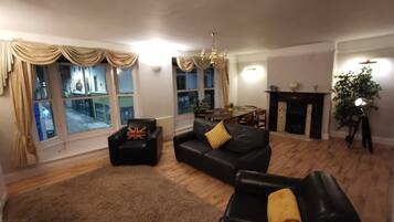 Apartment | Living room | 30-inch TV with cable channels