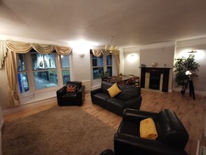Apartment | Living room | 30-inch TV with cable channels