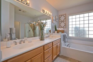 Primary bathroom with double sinks, tub and separate shower - Walk to Coachella · Private Pool & Spa · 3BR/3BA (Indio)