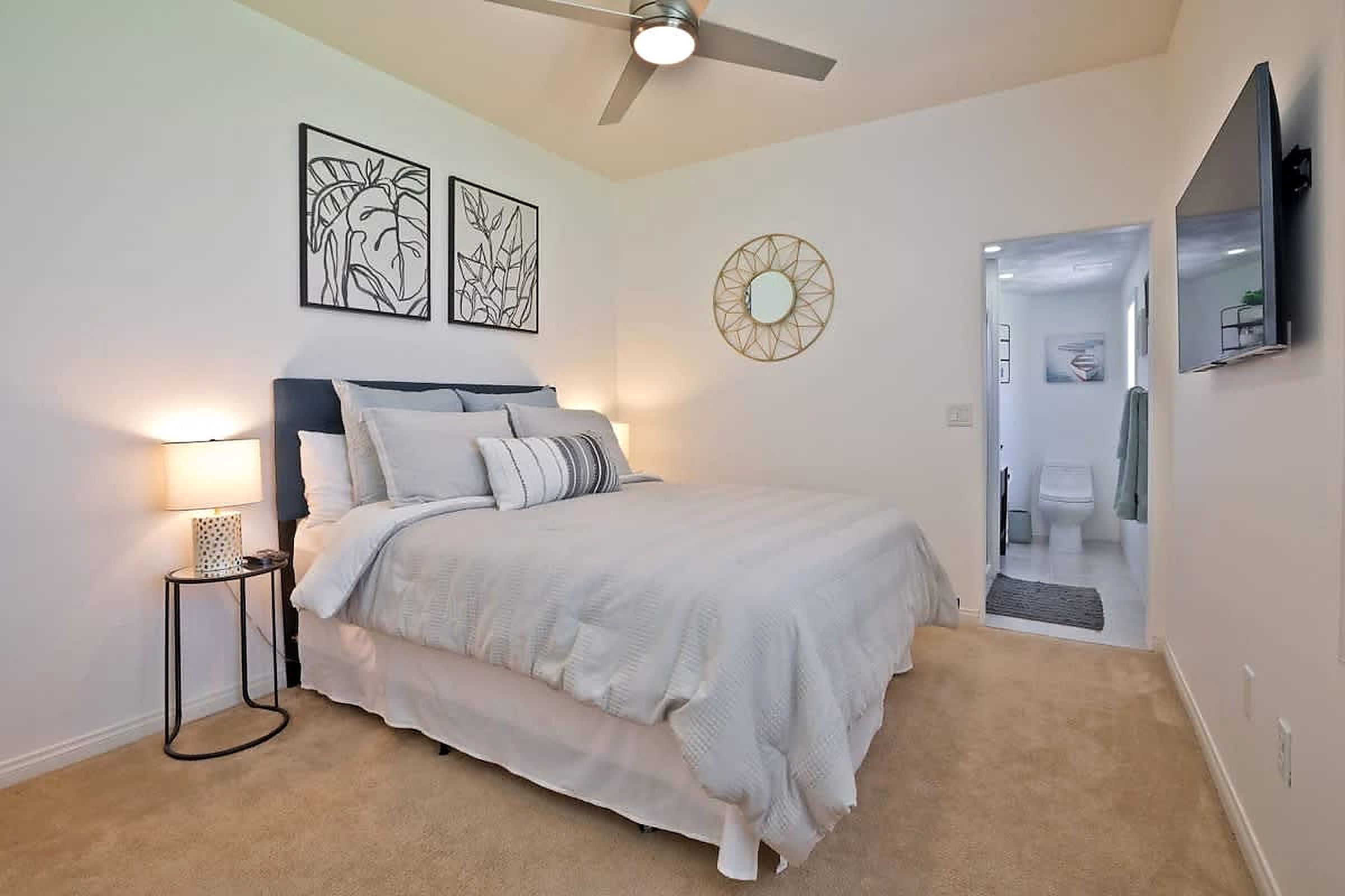 Queen bedroom with private bathroom and Smart TV