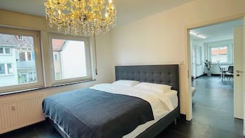 2 habitaciones, tabla de planchar con plancha, cuna de viaje y wifi