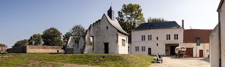 Jardín. Gîte Ferme D'hougoumont