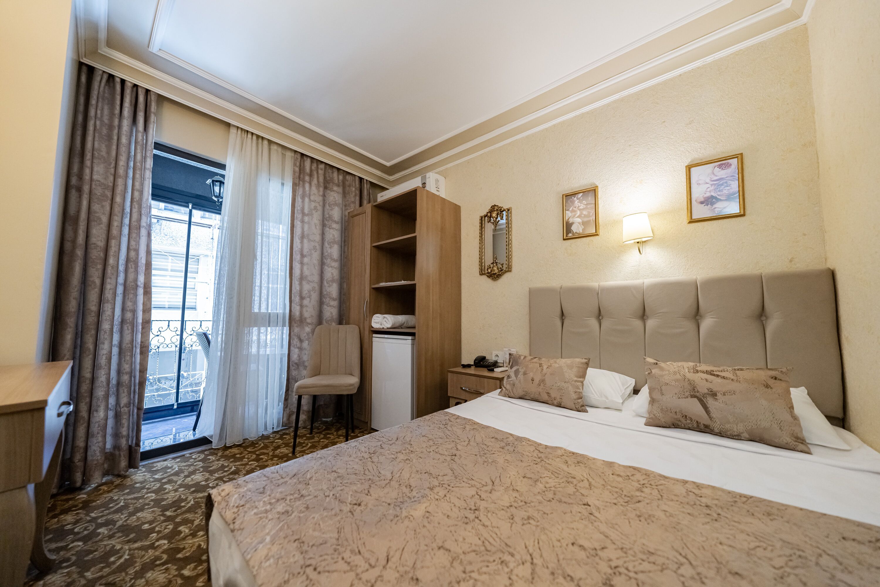 standard room with city view and french balcony (double bed) | desk, soundproofing, iron/ironing board, free wifi