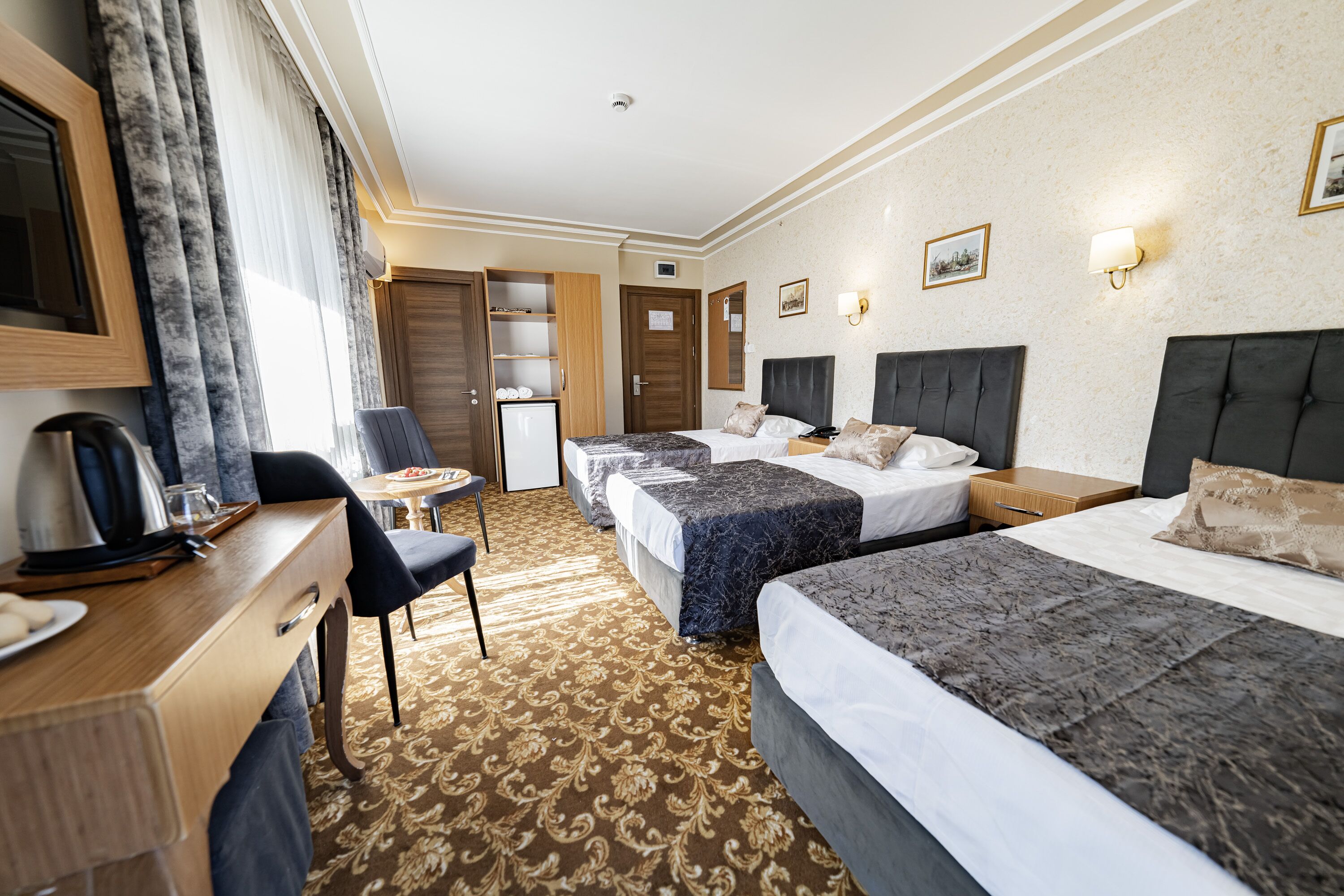 standard room - trp triple with city view and french balcony | desk, soundproofing, iron/ironing board, free wifi