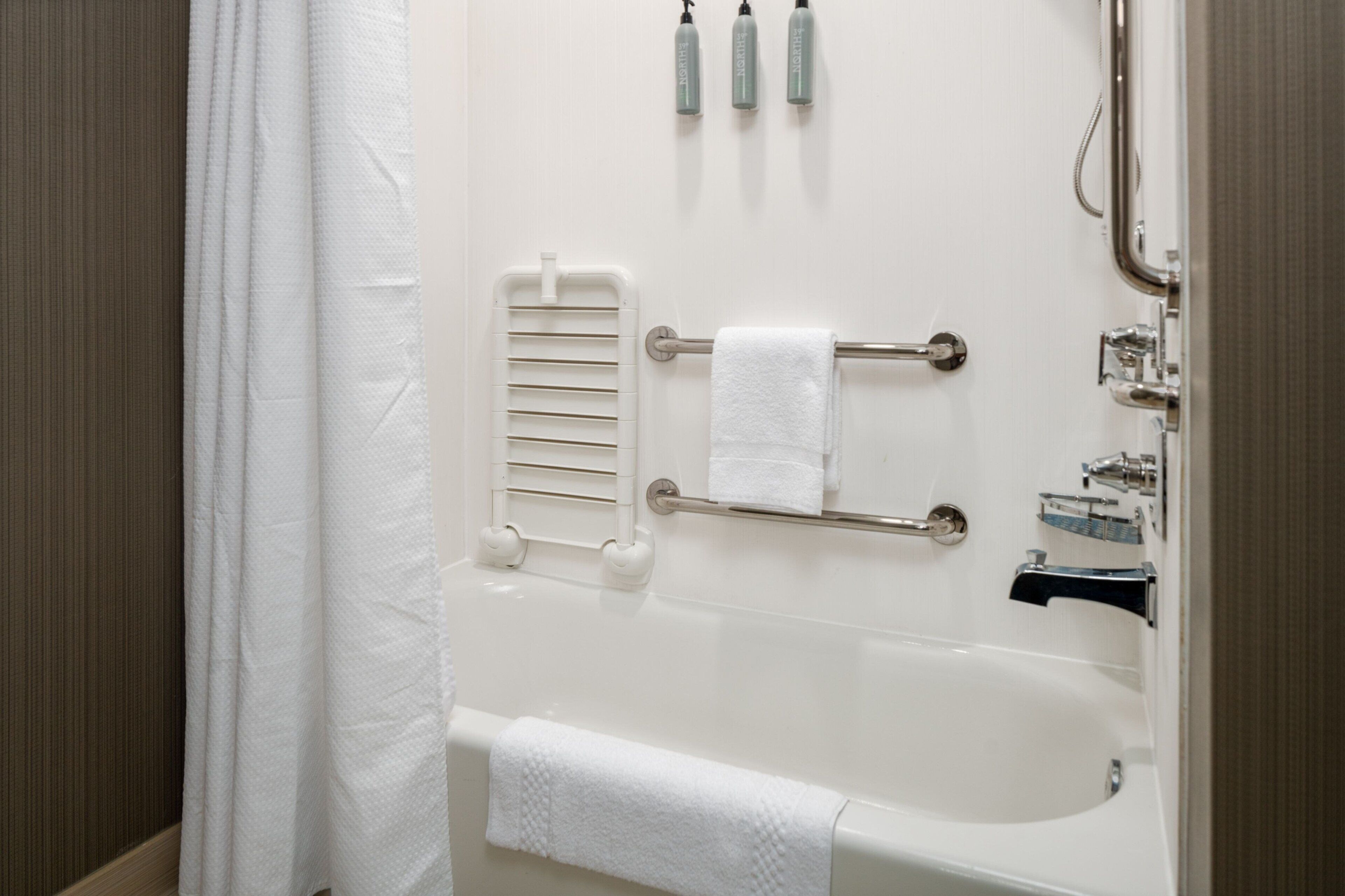 separate bathtub and shower, free toiletries, hair dryer, towels