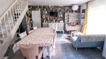 Cottage, en-suite badkamer, uitzicht op tuin | Dineren