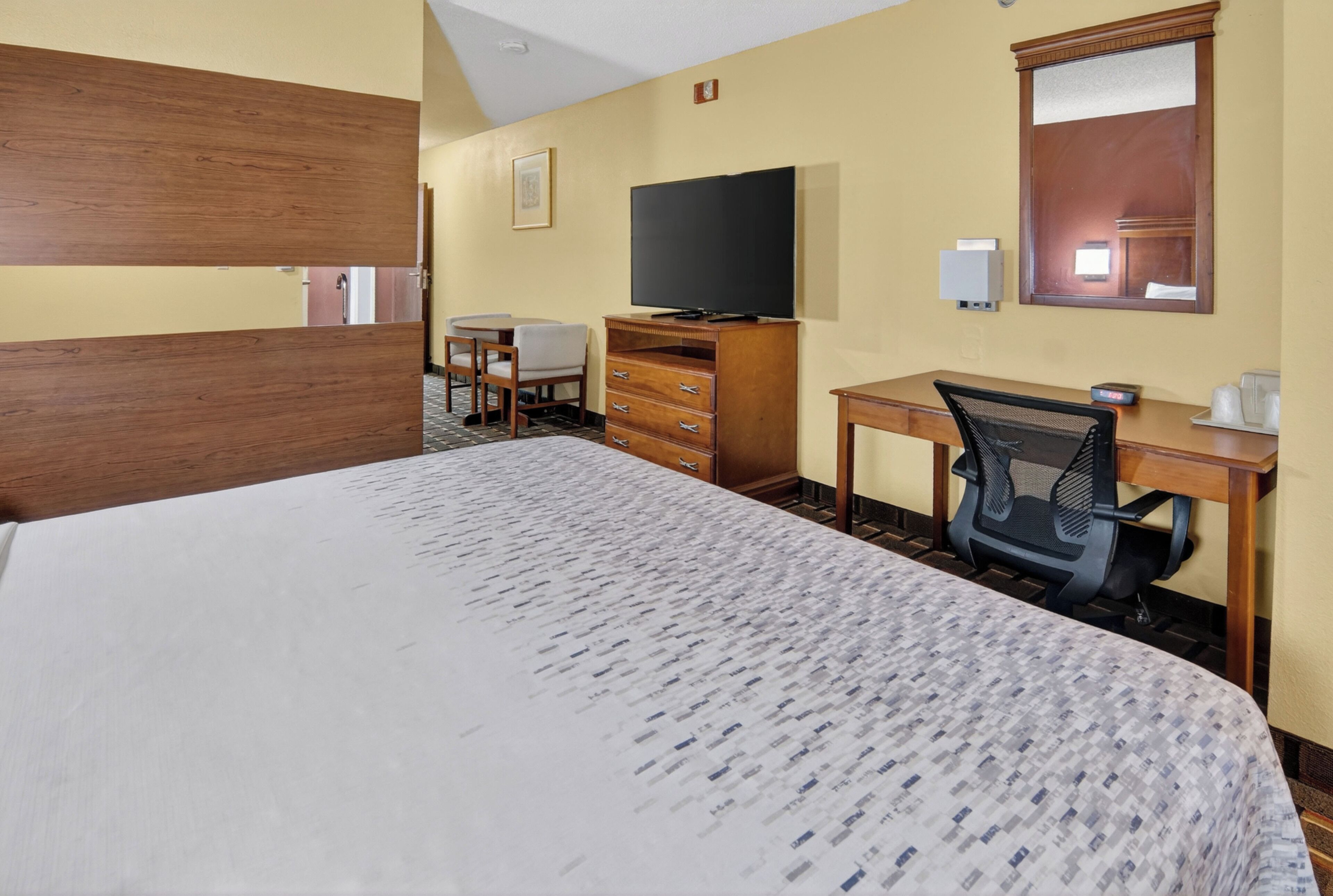 Individually furnished, desk, laptop workspace, iron/ironing board