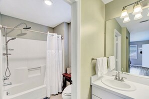 Combined shower/tub, towels, soap, toilet paper