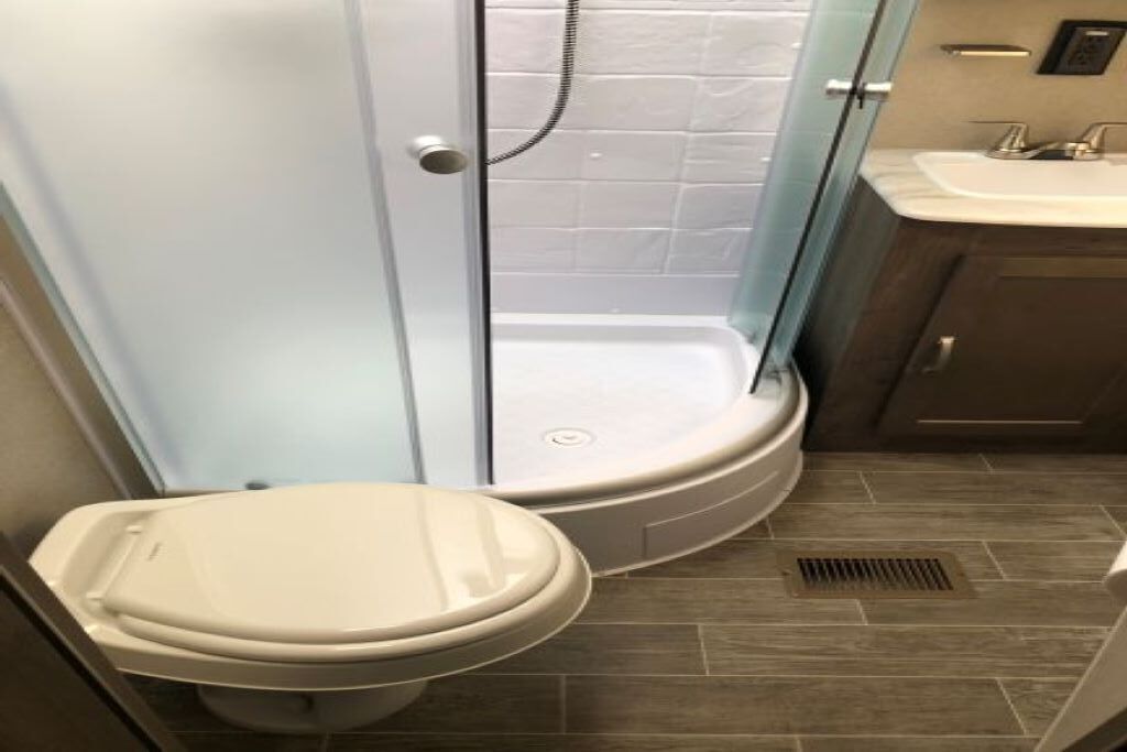 Shower, towels, toilet paper