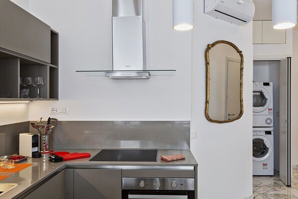 Fridge, oven, coffee/tea maker, cookware/dishes/utensils