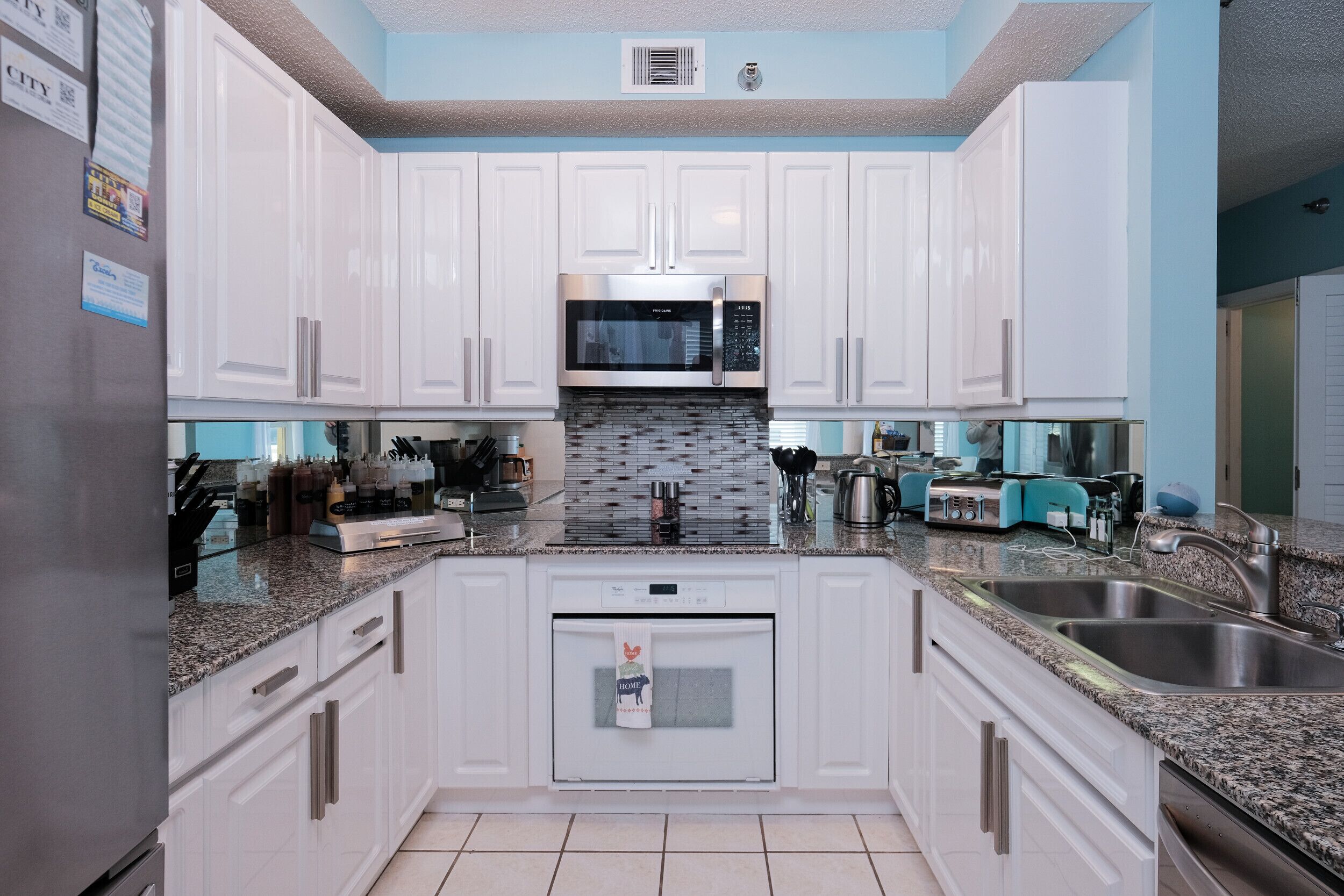 Coffee/tea maker, fridge, microwave, oven